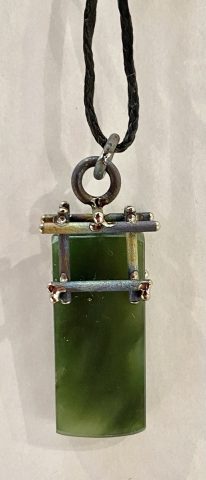 NA133- Pounamu, titanium and sterling silver pendant