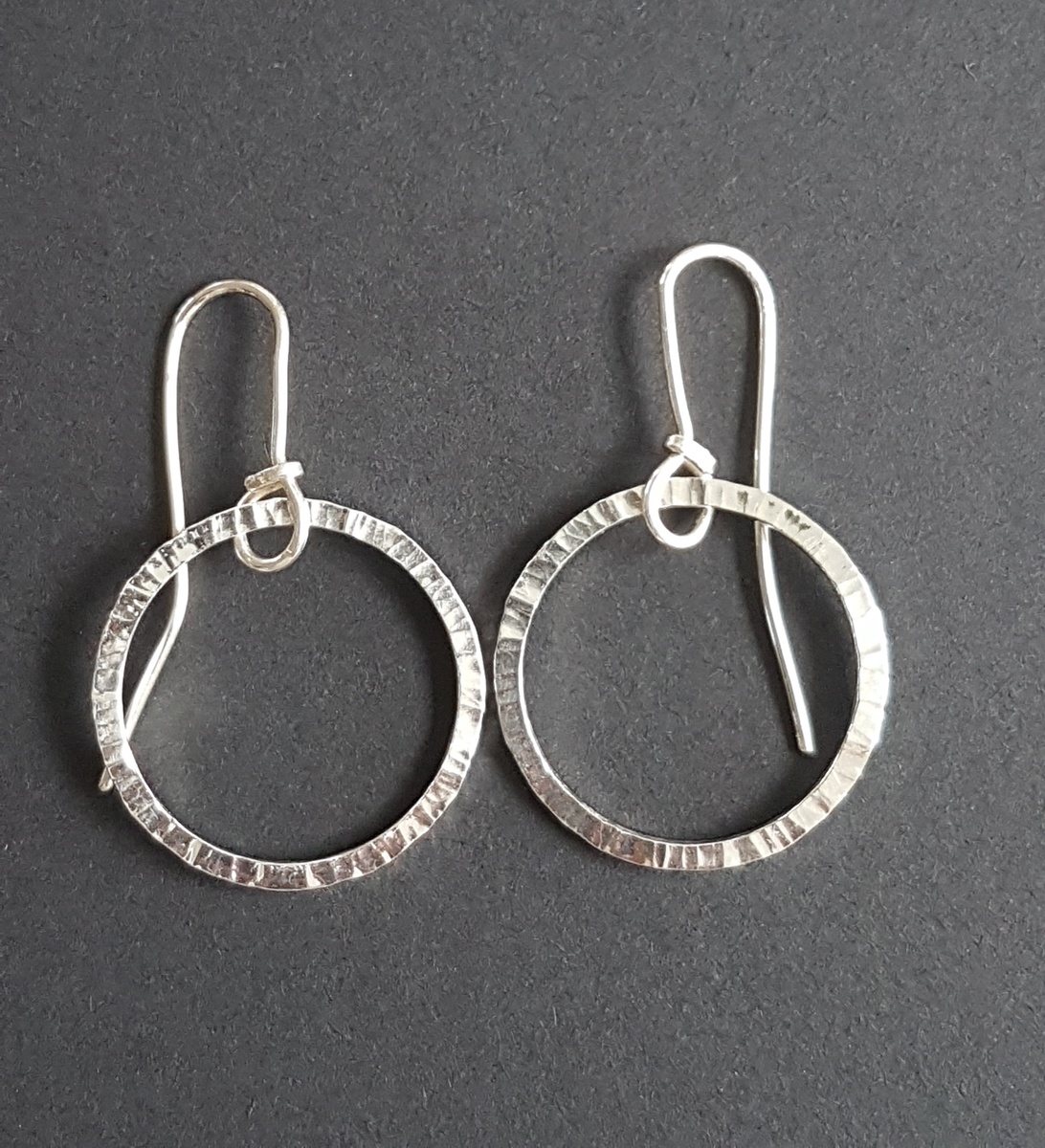 Sterling silver forged loop earrings