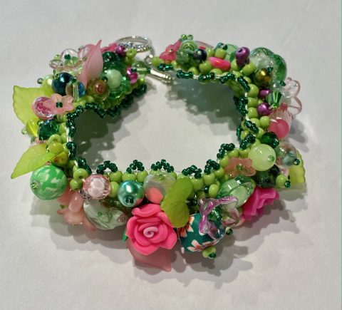 Bracelet - wide - multi coloured- grenns /pink