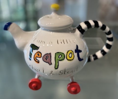 Teapot - on wheels with painted labels