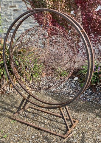 Suspended - Circle Sculpture with rusty wire ball