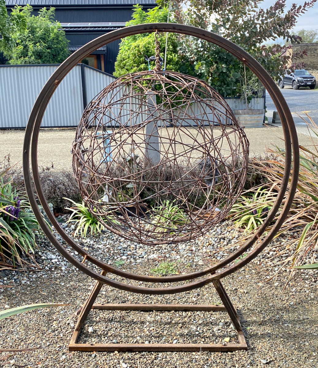 Suspended - Circle Sculpture with rusty wire ball