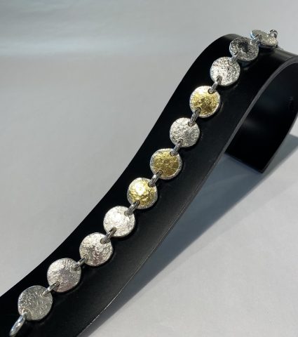 Fine and sterling silver bracelet with 22ct gold